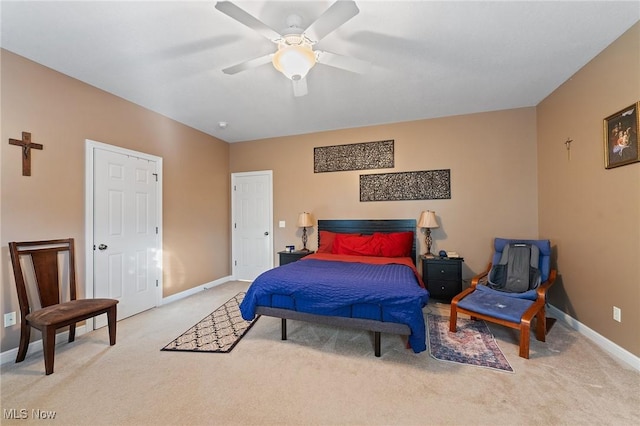 carpeted bedroom featuring ceiling fan