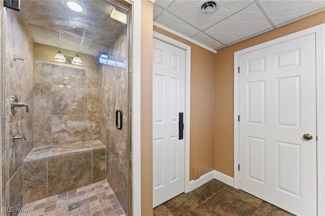 bathroom with a shower with shower door