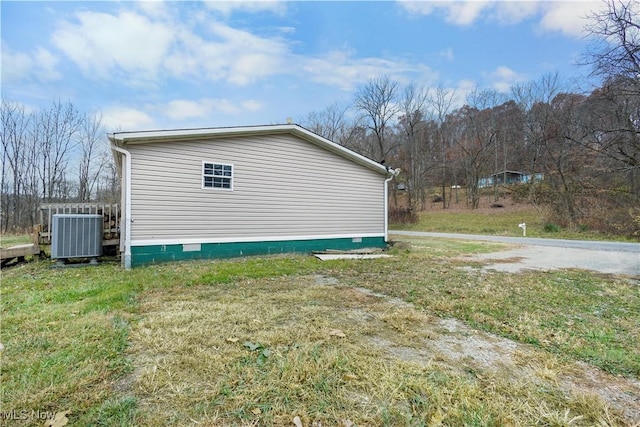 view of side of property with cooling unit