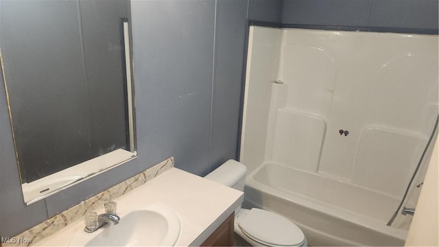 full bathroom with vanity, toilet, and tub / shower combination