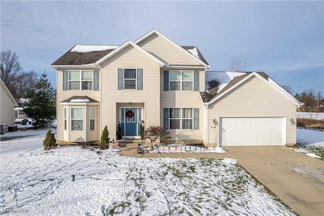 view of front of property with a garage