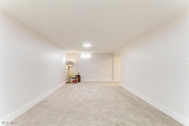 basement featuring carpet flooring