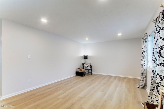 unfurnished room featuring light hardwood / wood-style flooring