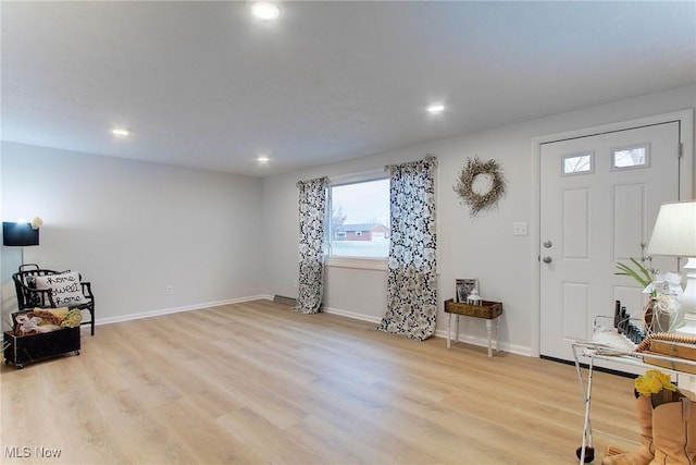 entrance foyer with light wood-type flooring