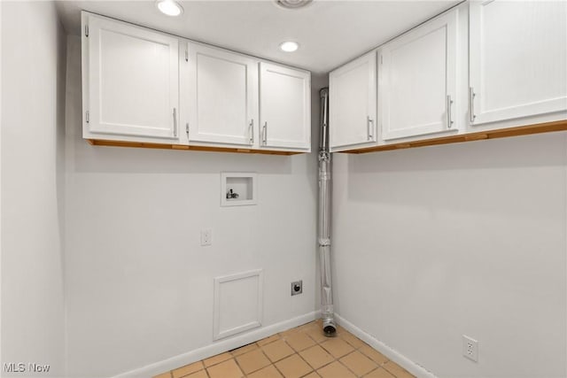 laundry room featuring recessed lighting, hookup for an electric dryer, washer hookup, baseboards, and cabinet space