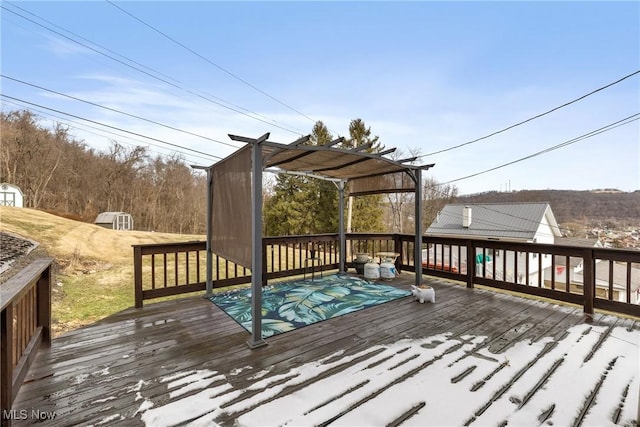 deck featuring a pergola