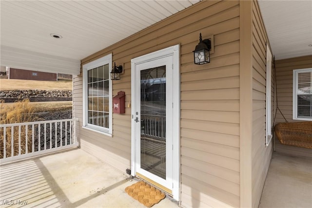 property entrance with a porch