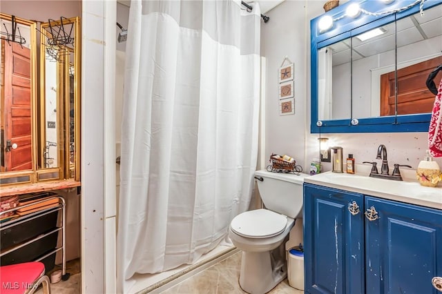 bathroom featuring a shower with curtain, tile patterned flooring, vanity, and toilet