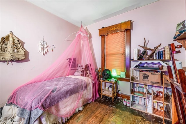 bedroom featuring dark wood-type flooring