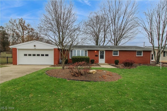 ranch-style home with a garage and a front lawn