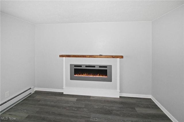 unfurnished living room featuring dark hardwood / wood-style flooring and a baseboard radiator