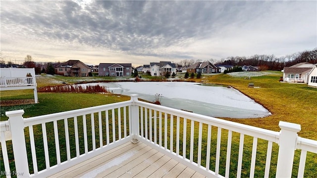 deck at dusk with a lawn