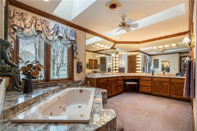 full bathroom with a ceiling fan, a tub with jets, crown molding, lofted ceiling, and vanity