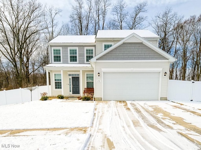 view of front of home with a garage