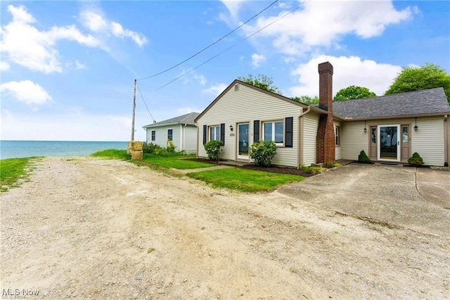 single story home with a water view