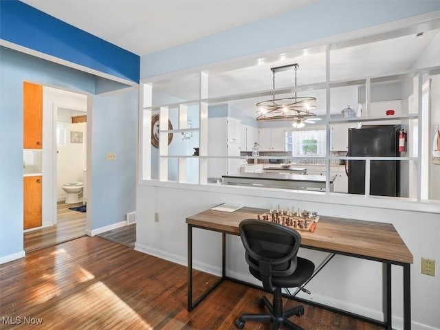 office area featuring ceiling fan and hardwood / wood-style flooring