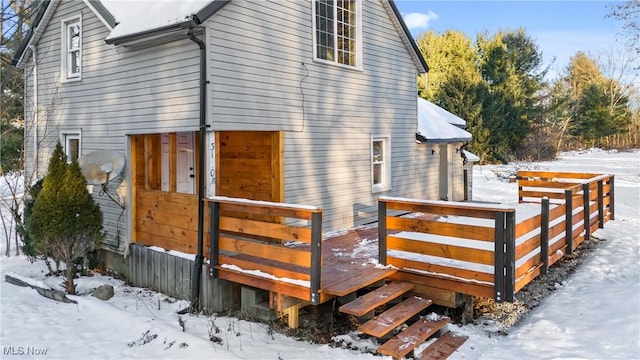 view of snow covered property