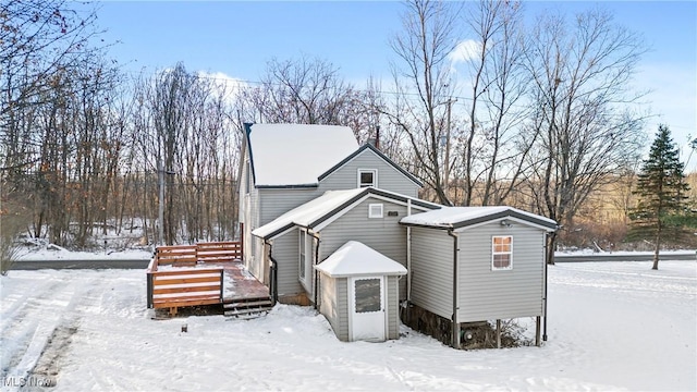 view of snow covered house