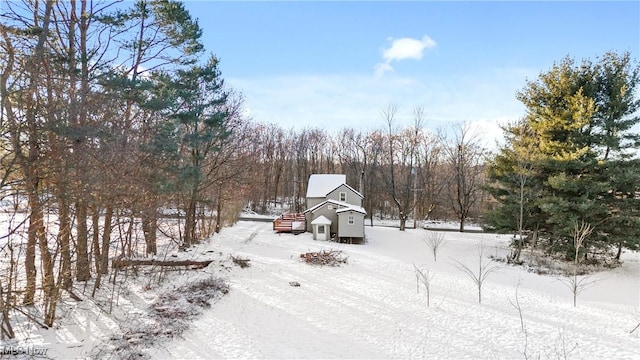 view of yard covered in snow