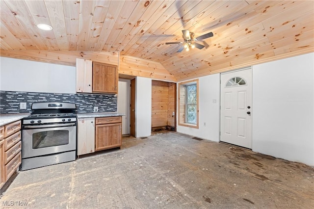 kitchen with wooden ceiling, gas stove, ceiling fan, lofted ceiling, and tasteful backsplash