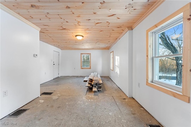 unfurnished room with ornamental molding and wooden ceiling