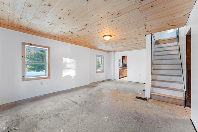 interior space featuring wood ceiling and crown molding