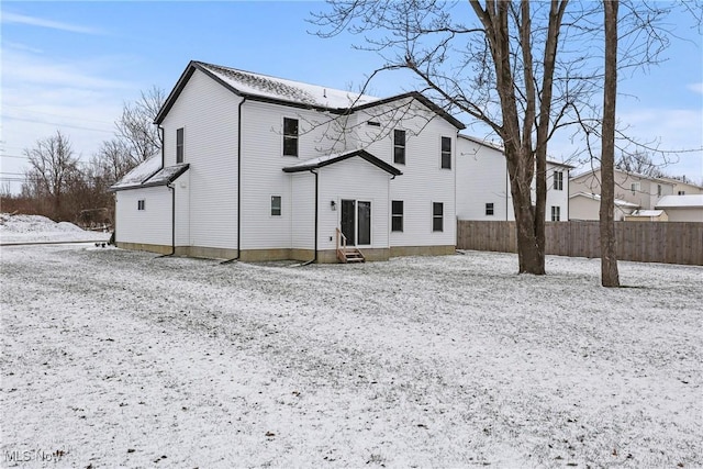 view of snow covered property