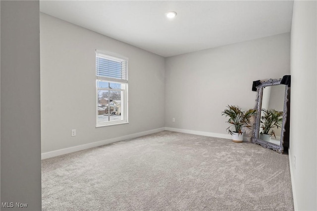 view of carpeted spare room