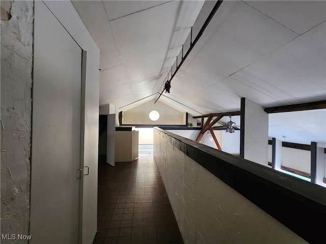 hallway with vaulted ceiling