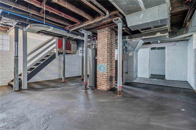 basement with heating unit and gas water heater