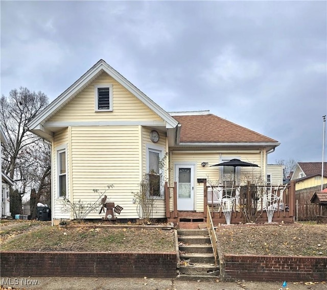 view of front of property featuring a deck