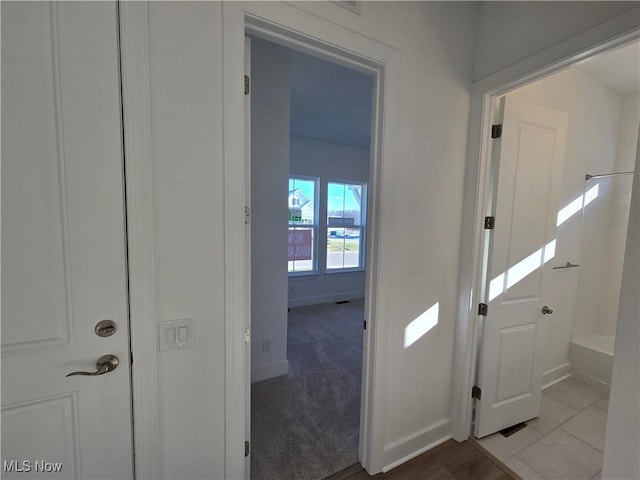 view of carpeted entrance foyer