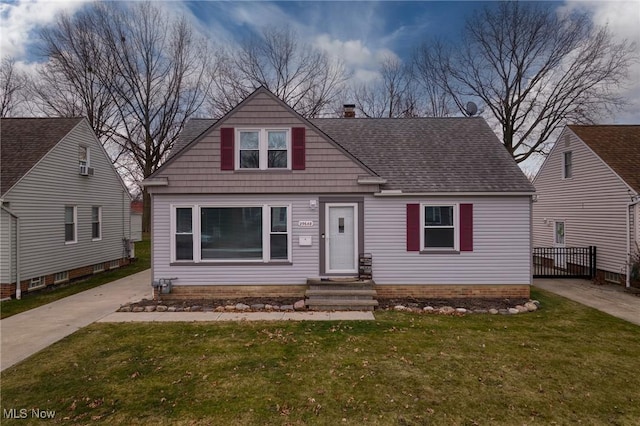 view of front of home with a front yard