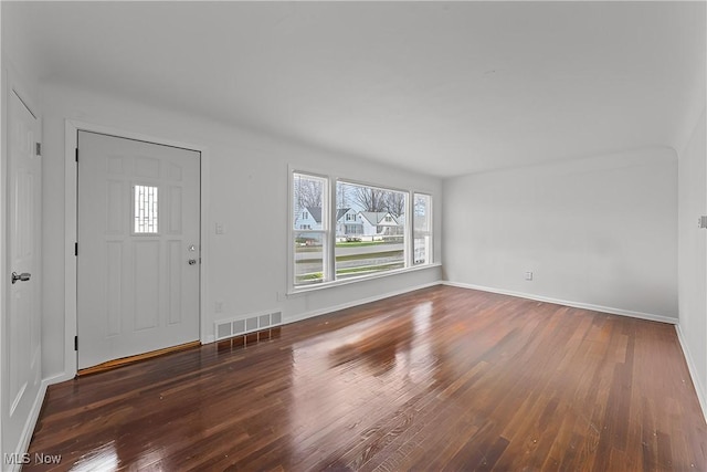 foyer featuring dark hardwood / wood-style flooring