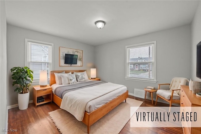 bedroom featuring hardwood / wood-style flooring