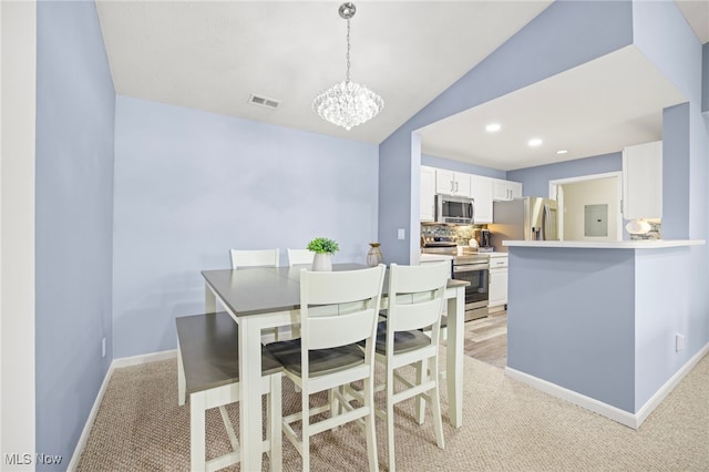 carpeted dining area featuring a notable chandelier, lofted ceiling, and electric panel