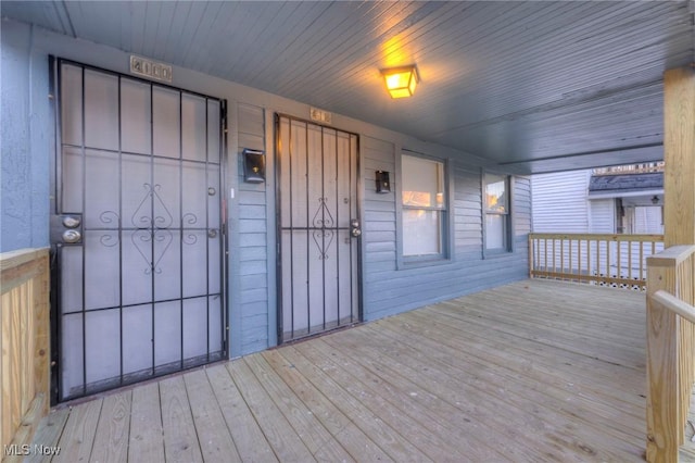 wooden deck featuring a porch