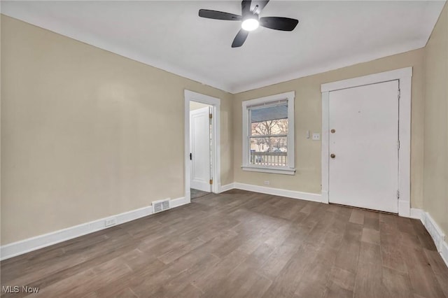 foyer featuring ceiling fan and hardwood / wood-style flooring