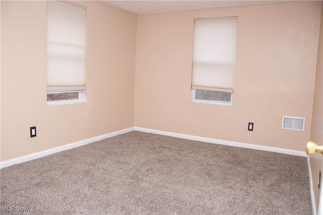 empty room featuring carpet