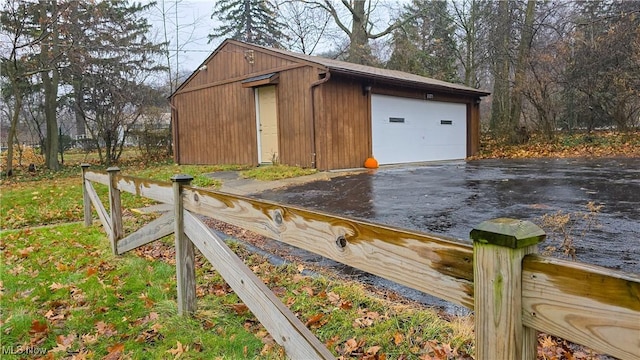 view of outbuilding featuring a garage