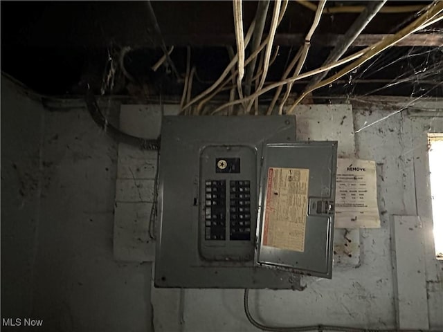 utility room featuring electric panel