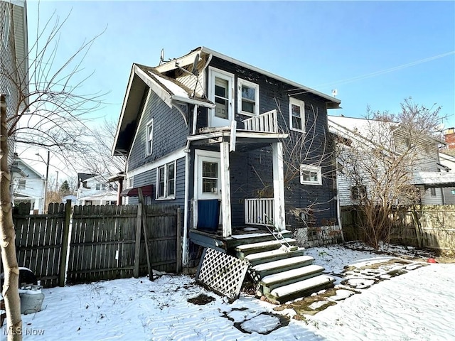 view of snow covered property