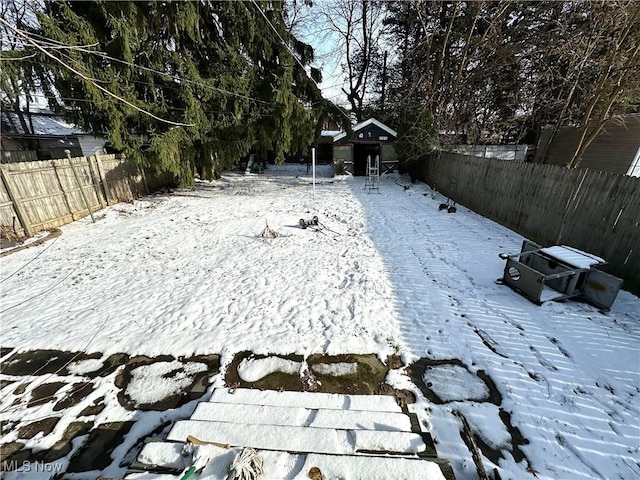 view of yard covered in snow