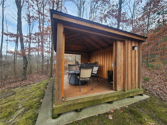 wooden terrace with a gazebo