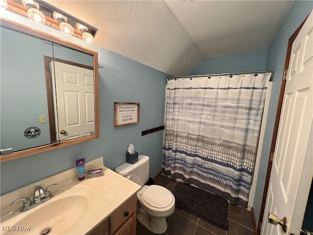 bathroom with tile patterned flooring, a textured ceiling, lofted ceiling, toilet, and vanity