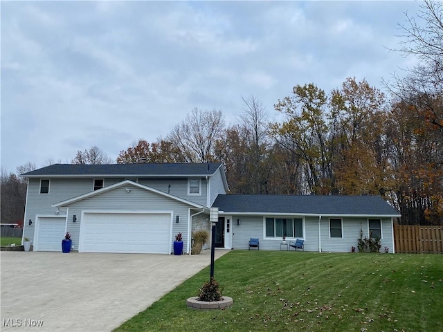 view of front of home featuring a garage and a front lawn