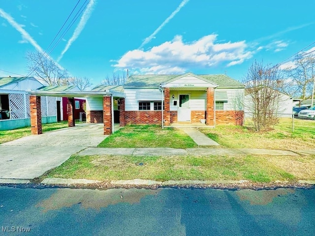 view of front of house featuring a carport