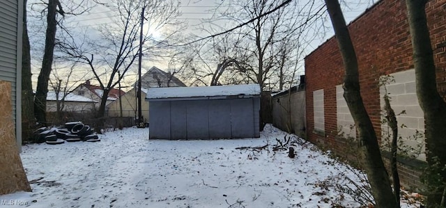 view of yard layered in snow