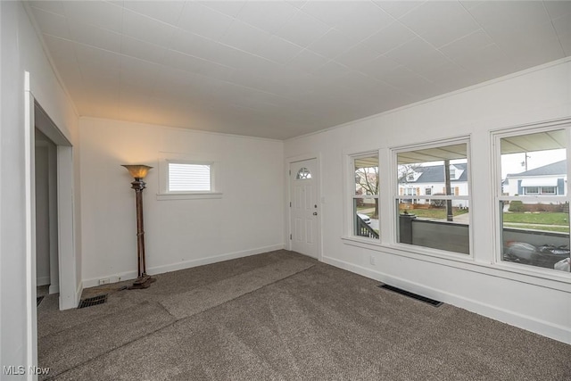 empty room with carpet flooring