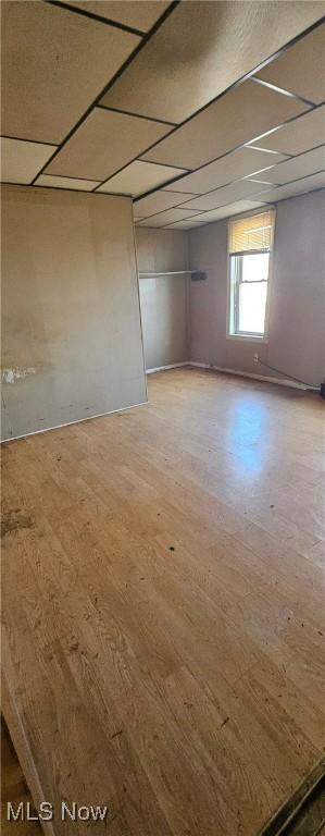 unfurnished room featuring hardwood / wood-style floors